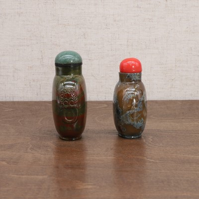 Lot 134 - Two Chinese jasper snuff bottles