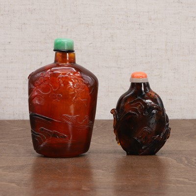Lot 152 - Two Chinese amber snuff bottles