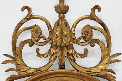 Lot 6 - A George III-style giltwood and gesso oval mirror