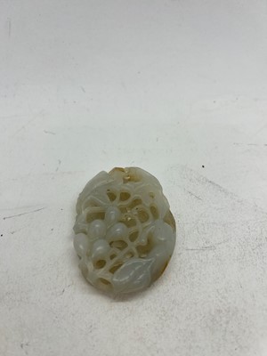 Lot 140 - A Chinese jade plaque