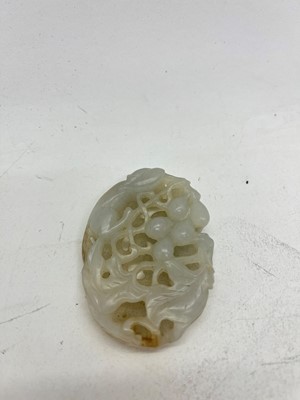 Lot 140 - A Chinese jade plaque