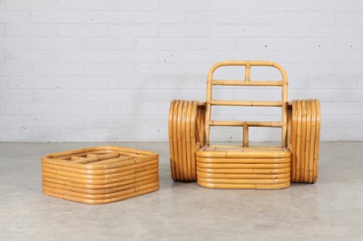 Lot 166 - A bamboo and rattan 'Pretzel' armchair and ottoman
