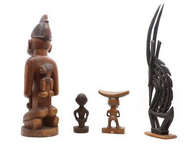 Lot 351 - A group of four African wood carvings