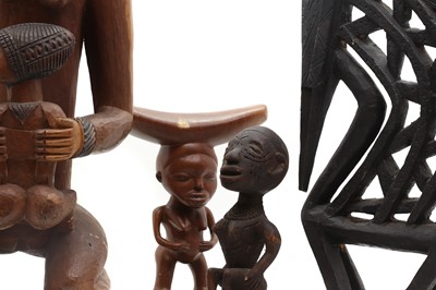 Lot 351 - A group of four African wood carvings