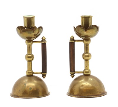 Lot 338 - A pair of brass Benham & Froud candlesticks