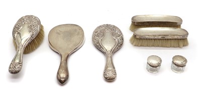 Lot 59 - A collection of silver-mounted dressing table items