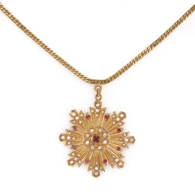 Lot 137 - An Indian gold gold ruby and split pearl pendant
