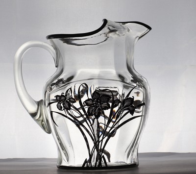 Lot 93 - A silver overlaid glass water jug