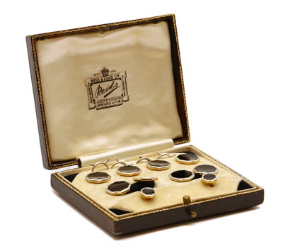 Lot 34 - A boxed set of gold and platinum cufflinks and dress studs
