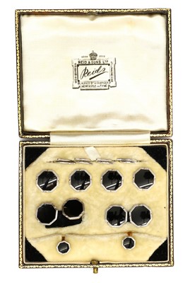 Lot 34 - A boxed set of gold and platinum cufflinks and dress studs