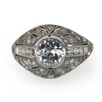 Lot 69 - A French Art Deco platinum and diamond bombé ring