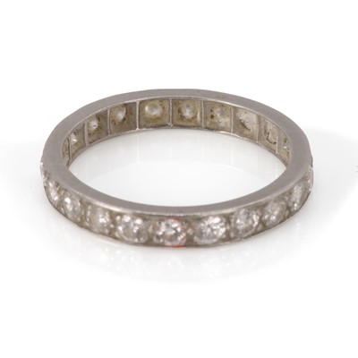 Lot 16 - A platinum diamond full eternity ring
