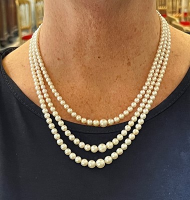 Lot 213 - A three row cultured pearl necklace, c.1930