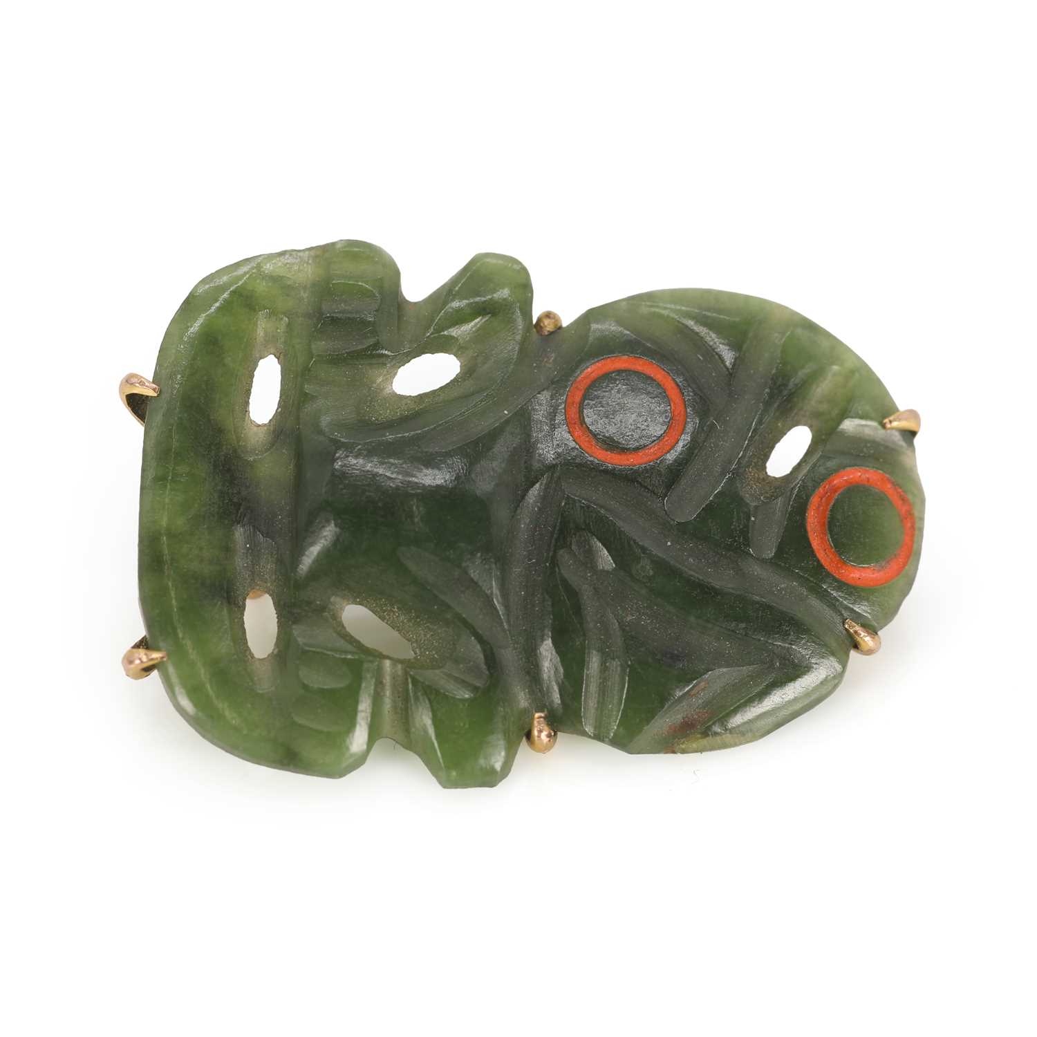 Lot 97 - A New Zealand jade tiki brooch