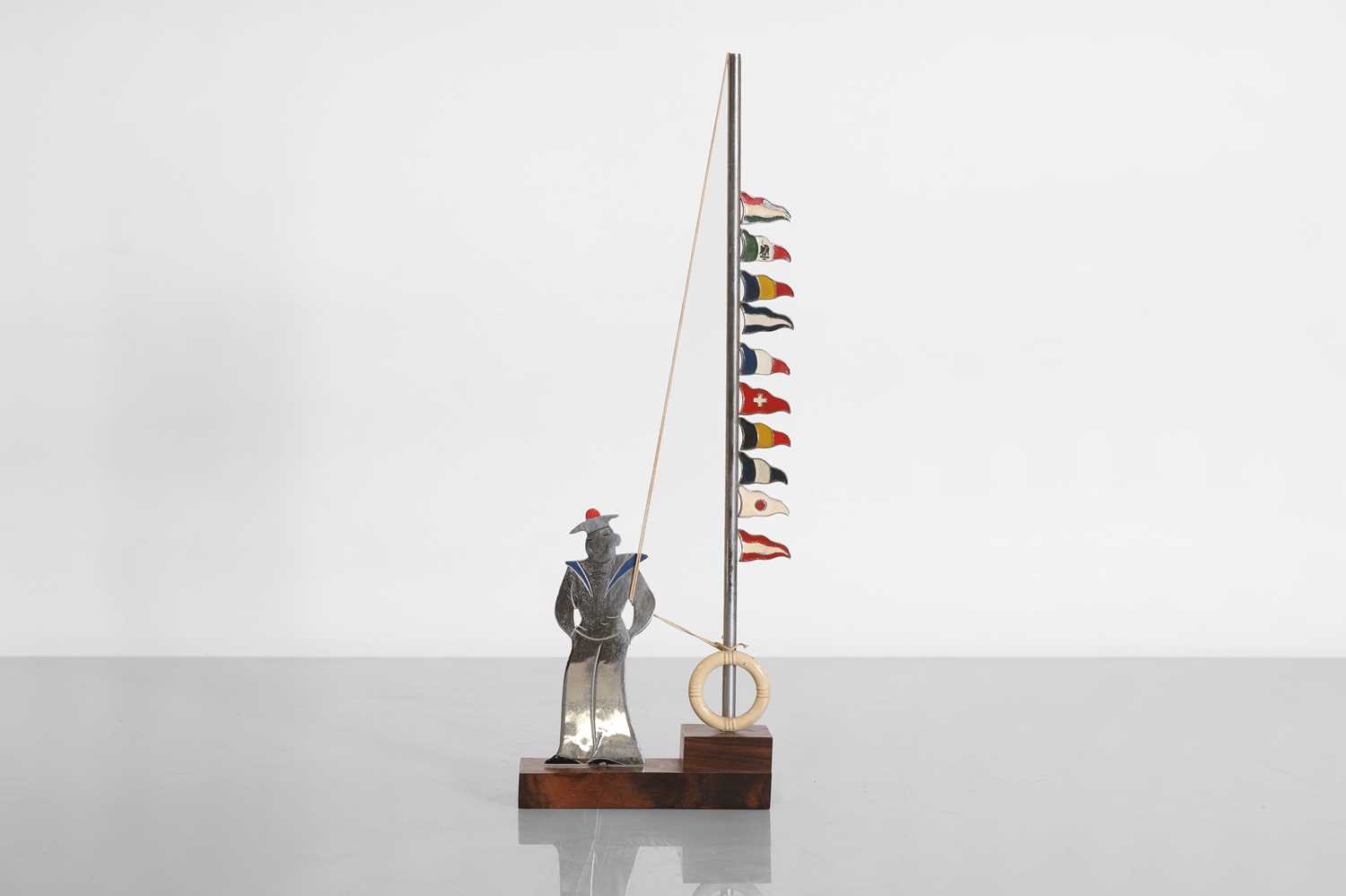 Lot 137 - A French 'sailor boy' glass marker set