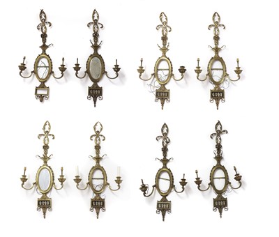 Lot 475 - A set of eight Neoclassical style brass twin branch wall appliques