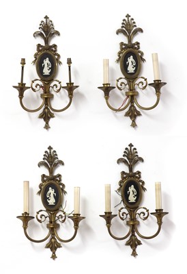 Lot 476 - A set of four twin branch wall lights