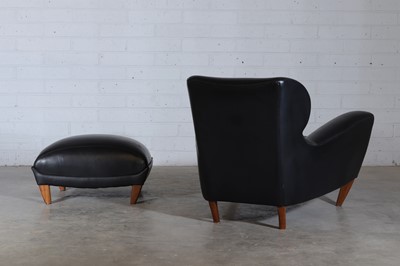 Lot 281 - An 'Aston' armchair and ottoman
