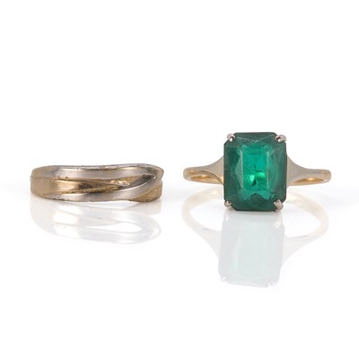 Lot 149 - A single stone paste ring and a crossover band ring