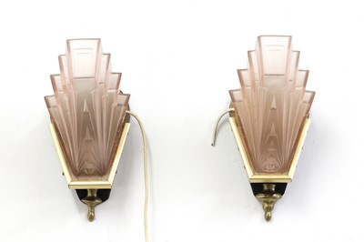 Lot 357 - A pair of Art Deco pink-tinted wall lights