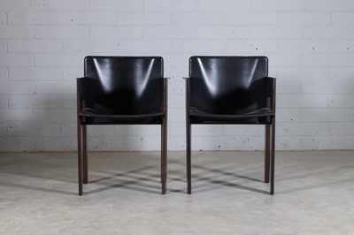 Lot 274 - A pair of Dutch leather and stained beech armchairs