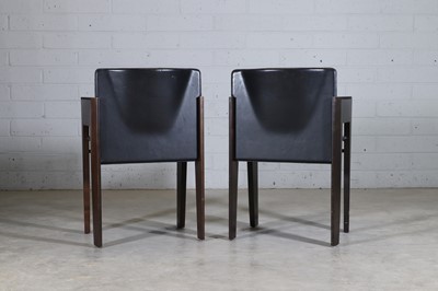 Lot 274 - A pair of Dutch leather and stained beech armchairs
