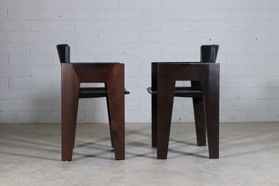 Lot 274 - A pair of Dutch leather and stained beech armchairs