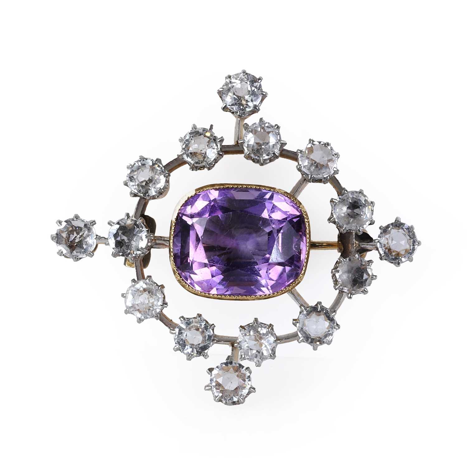 Lot 47 - An Edwardian amethyst and white topaz brooch/pendant