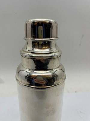 Lot 13 - Two silver plated cocktail shakers