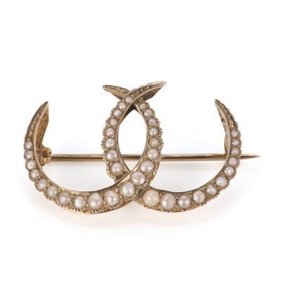Lot 7 - An Edwardian gold split pearl double crescent brooch, by Murrle Bennett & Co.