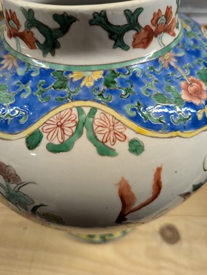 Lot 175 - A pair of Chinese famille verte vases and covers