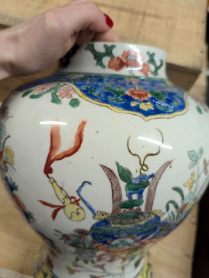 Lot 175 - A pair of Chinese famille verte vases and covers