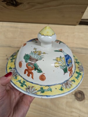 Lot 175 - A pair of Chinese famille verte vases and covers