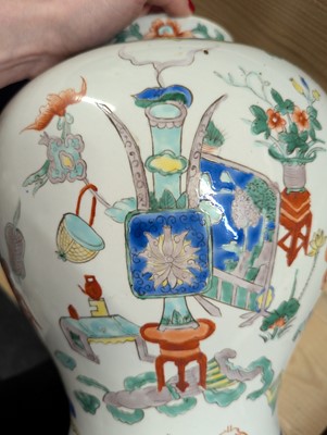 Lot 175 - A pair of Chinese famille verte vases and covers