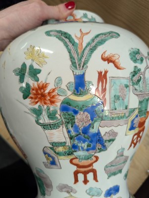 Lot 175 - A pair of Chinese famille verte vases and covers