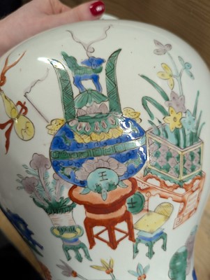 Lot 175 - A pair of Chinese famille verte vases and covers