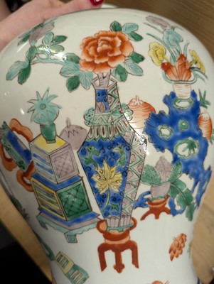 Lot 175 - A pair of Chinese famille verte vases and covers