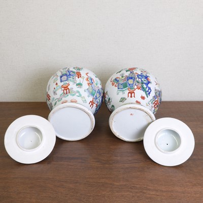 Lot 175 - A pair of Chinese famille verte vases and covers