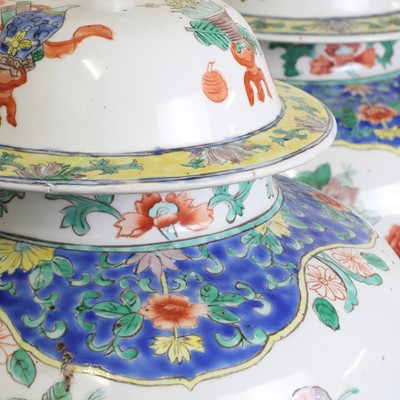 Lot 175 - A pair of Chinese famille verte vases and covers
