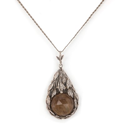 Lot 13 - An Arts and Crafts silver and smoky quartz set pendant, attributed to Bernard Instone