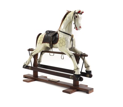 Lot 156 - A painted wood rocking horse