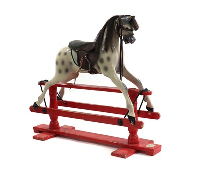 Lot 155 - A painted wood rocking horse