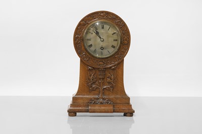 Lot 295A - A Scottish Arts and Crafts oak mantel clock