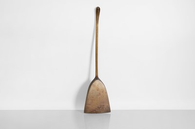 Lot 102 - A rare patinated bronze fire shovel