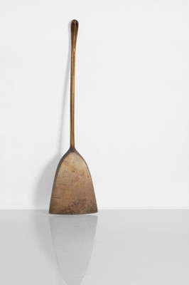 Lot 102 - A rare patinated bronze fire shovel