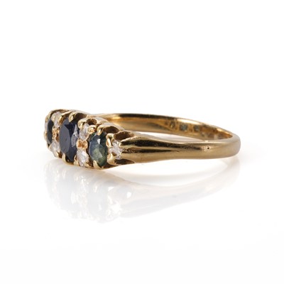 Lot 102 - A sapphire and diamond boat shaped ring