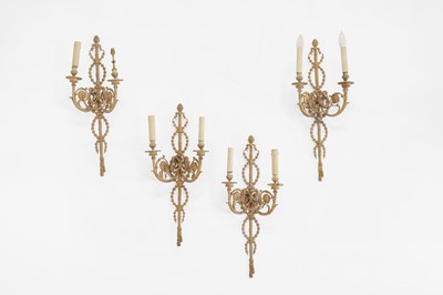 Lot 400 - A set of four George III-style gilt-brass wall lights