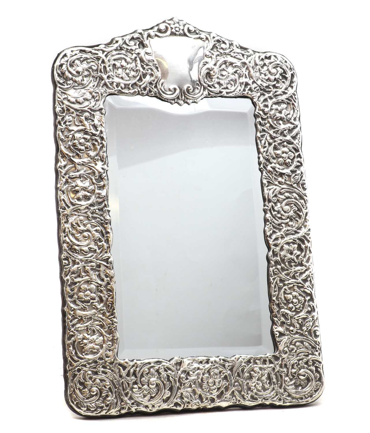 Lot 20 - A silver mounted table mirror