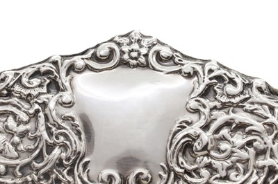 Lot 20 - A silver mounted table mirror