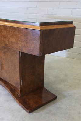 Lot 144 - A French Art Deco walnut console table